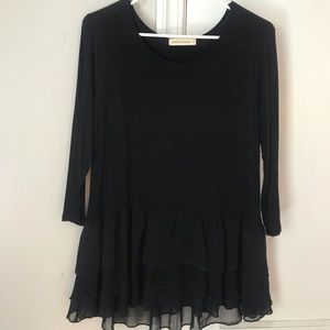 Black tiered ruffle peplum top.